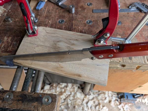 2026-07-05-04-sawing-offcut-for-wedges_600.jpg