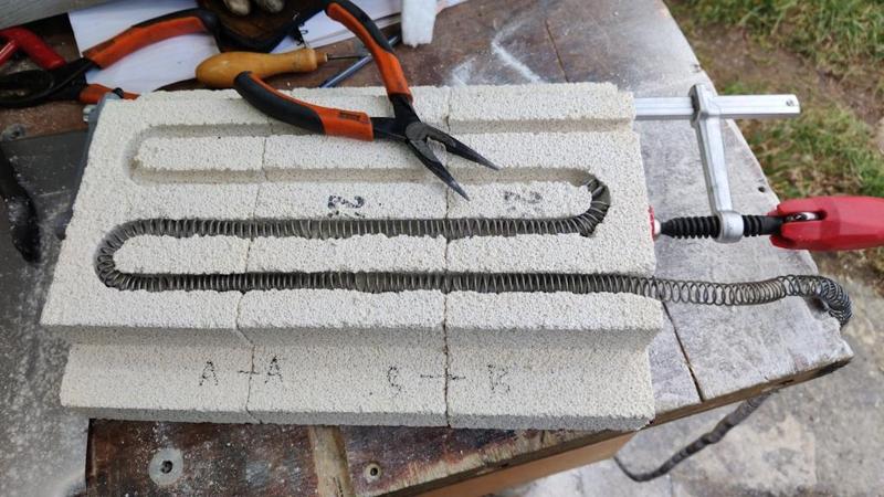 2025-01-19-11-feeding-coil-through-first-side_800.jpg