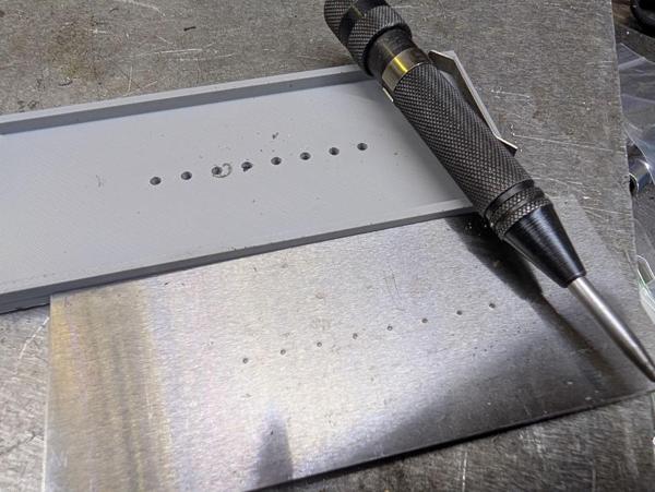2026-04-04-02-3d-printed-punch-marking-guide_600.jpg