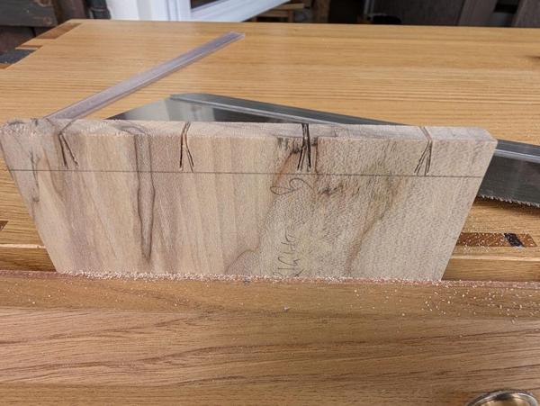 2025-09-09-15-sawing-bottom-tails_600.jpg